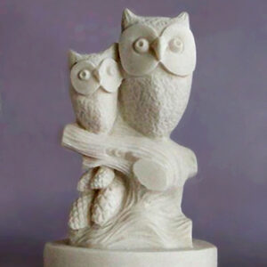 Two Owls (Mother and child) sitting on a tree branch in Patina color