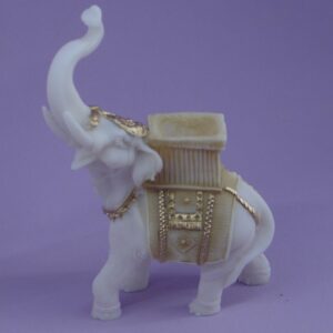 The statue of an Elephant with carrying case in Patina color