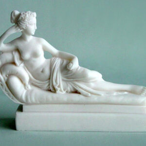 A replica statue of Paolina Borghese made by Canova in White color