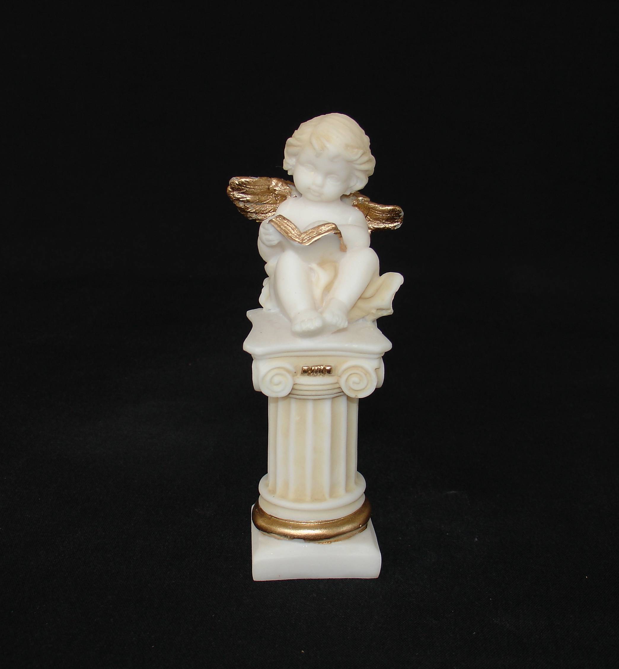 2-629-p-front A statue of an Angel sitting on a column in Patina color
