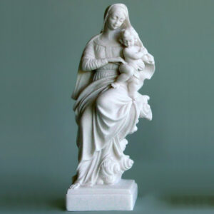 The statue of Mary embracing the baby Jesus in her arms in White color