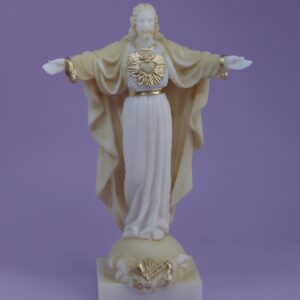 The whole statue of Jesus Christ with his hands open in Patina color