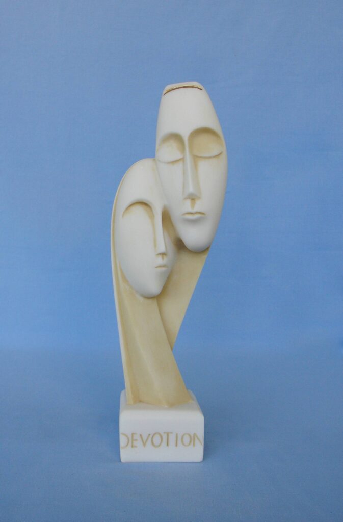The statue of a man and a woman depicts the devotion to each other in Patina color
