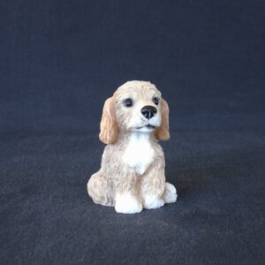 Greek statue of a Poodle pet dog statue sitting on the floor
