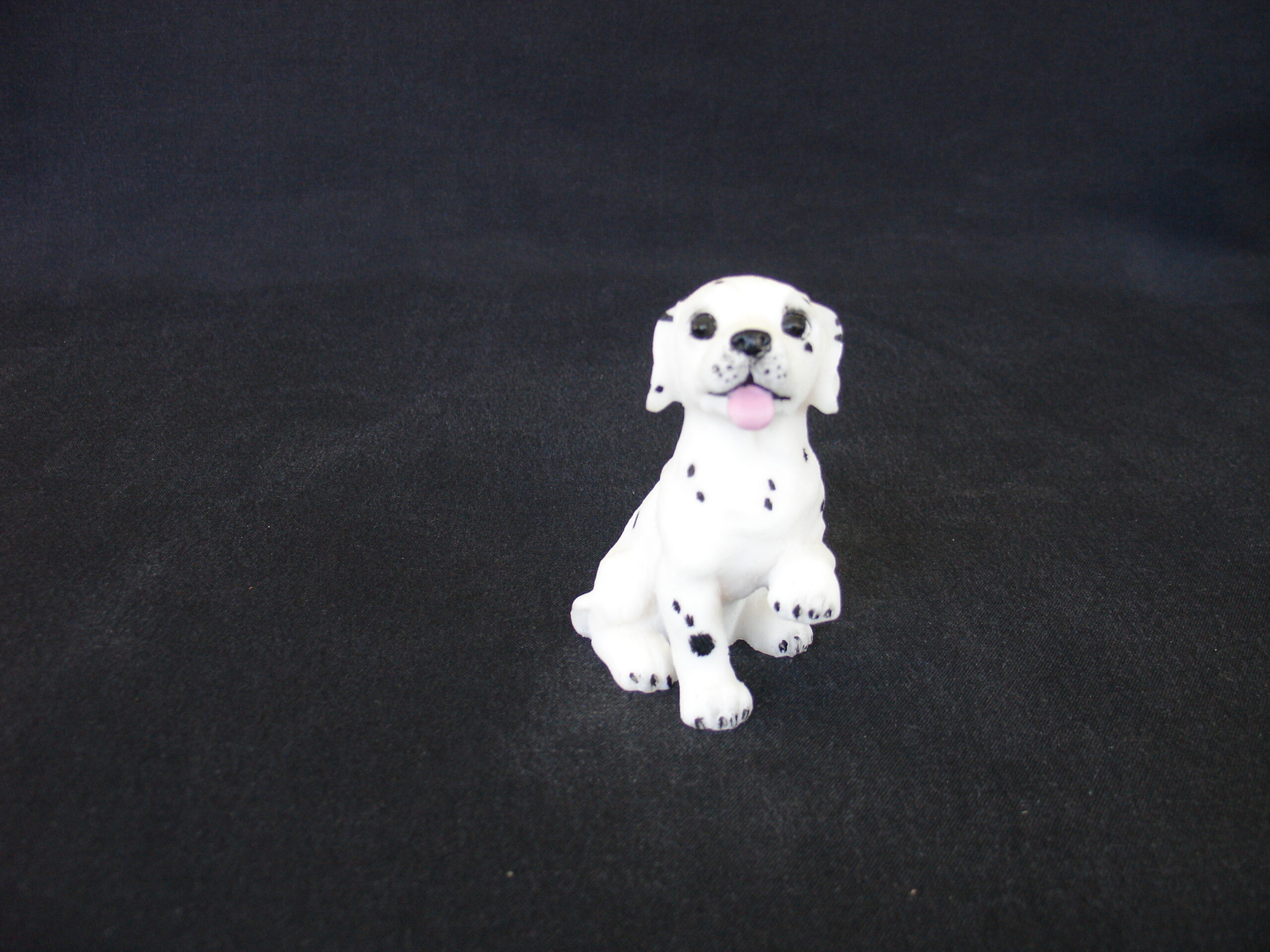 d-007-DSC04062 Greek statue of a Dalmatian baby pet dog statue sitting on the floor