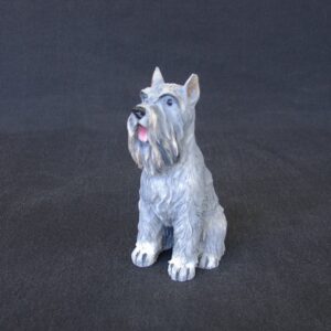 Schnauzer pet dog statue sitting on the floor